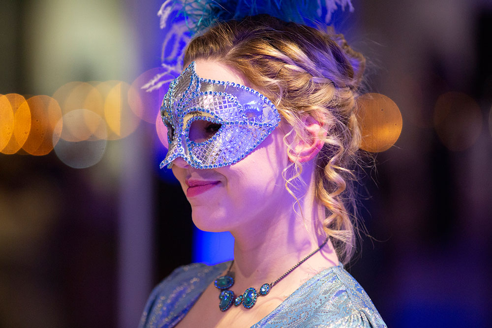 Woman in blue mask